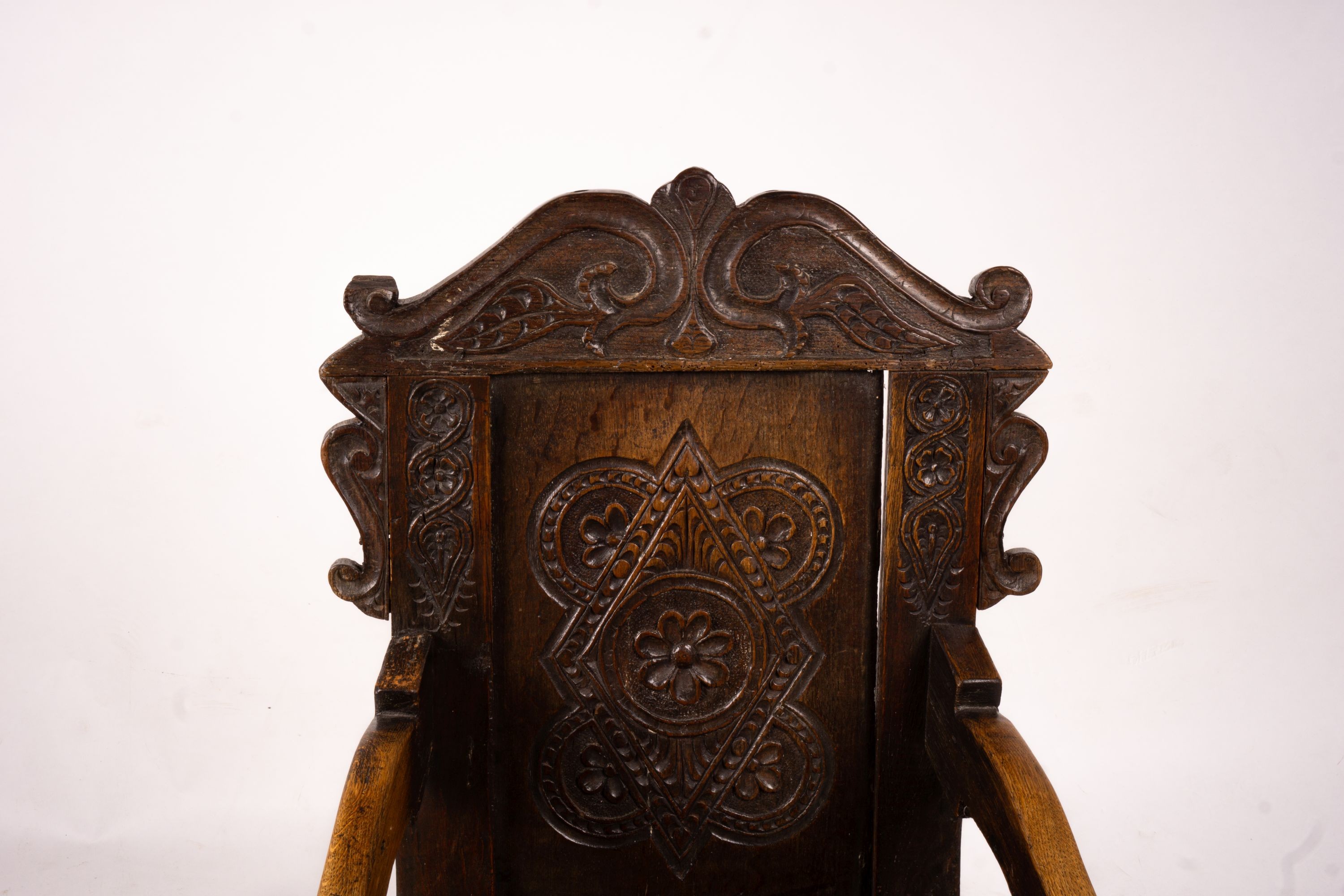 A 17th century style oak Wainscot chair, width 54cm, depth 52cm, height 104cm